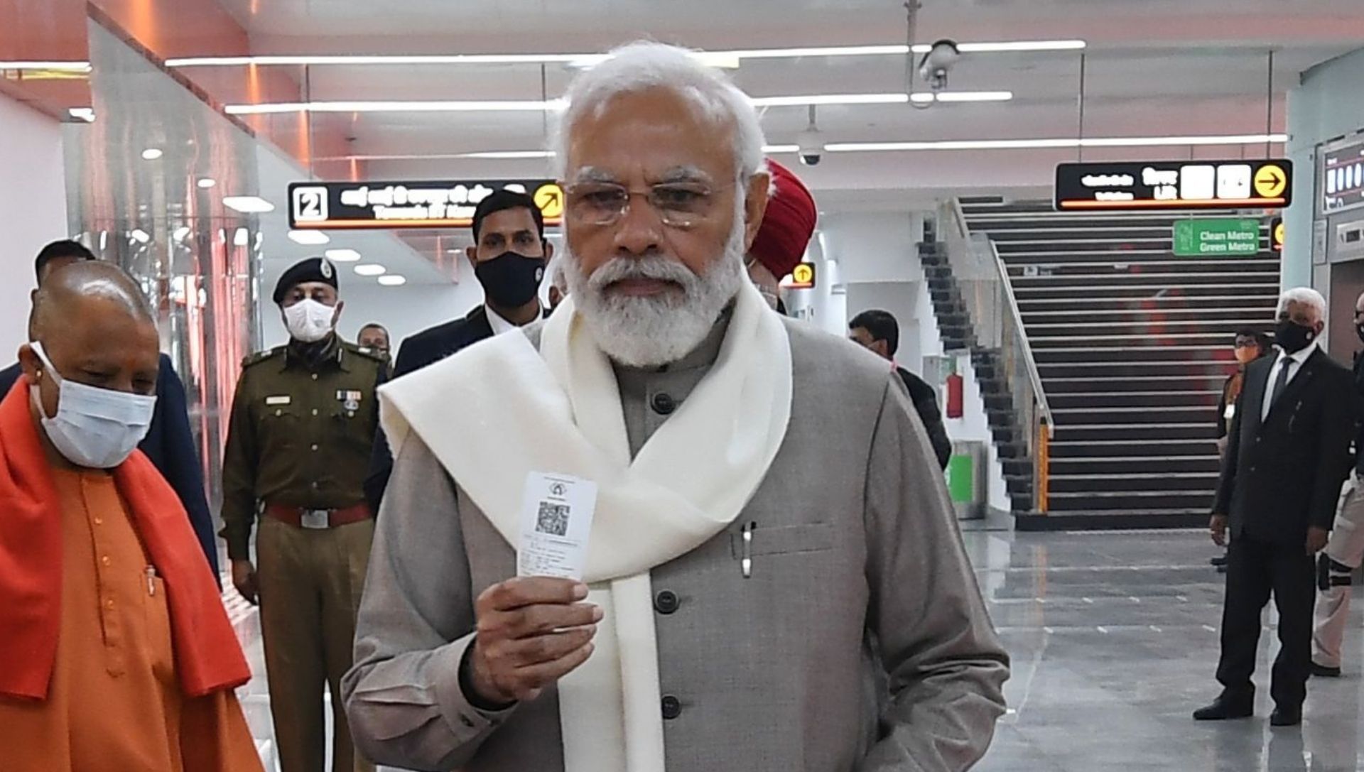 PM modi showing Kanpur metro ticket