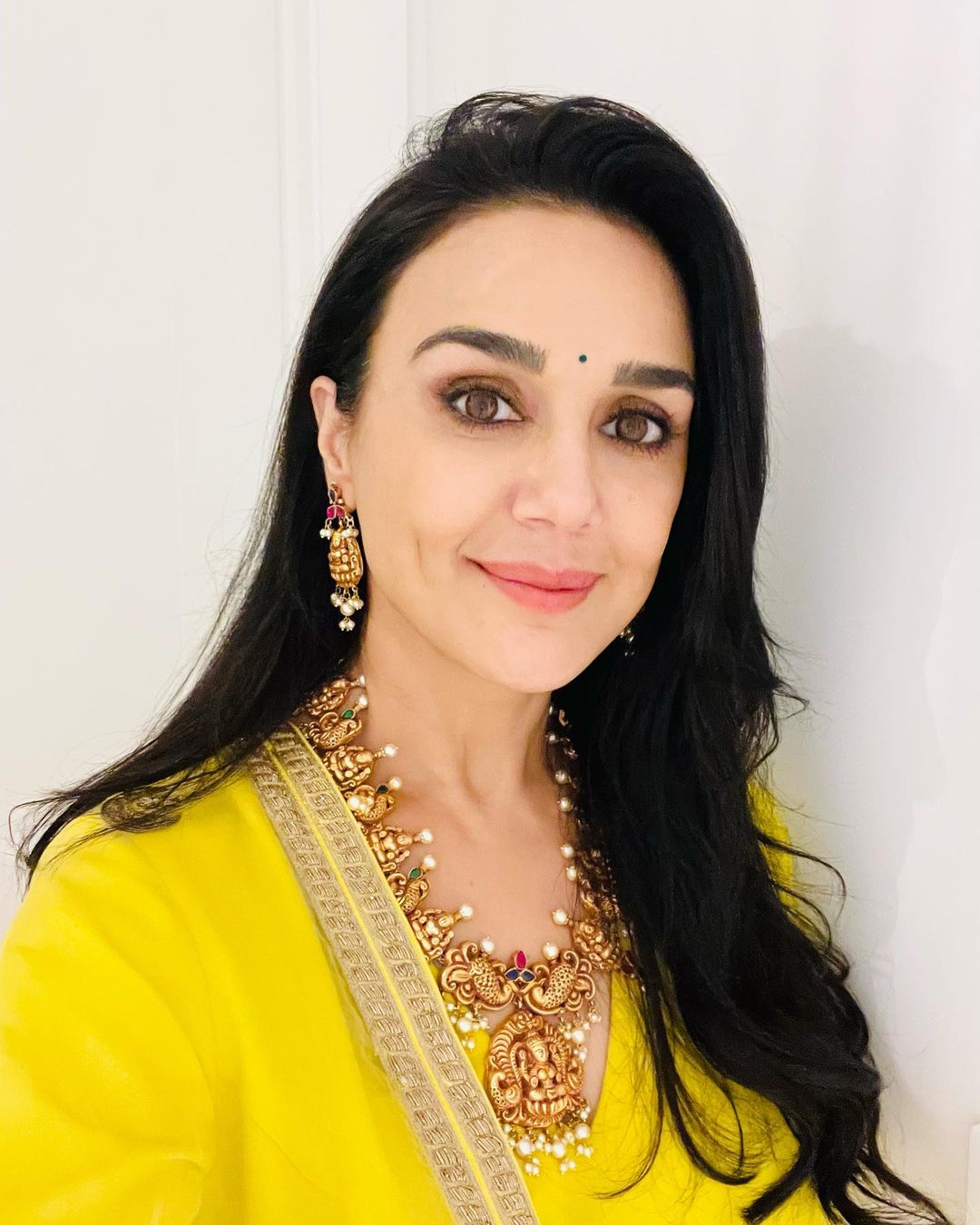 Preity Zinta in Mekhela Chador by Sanjukta Dutta – Boutiquesarees.com