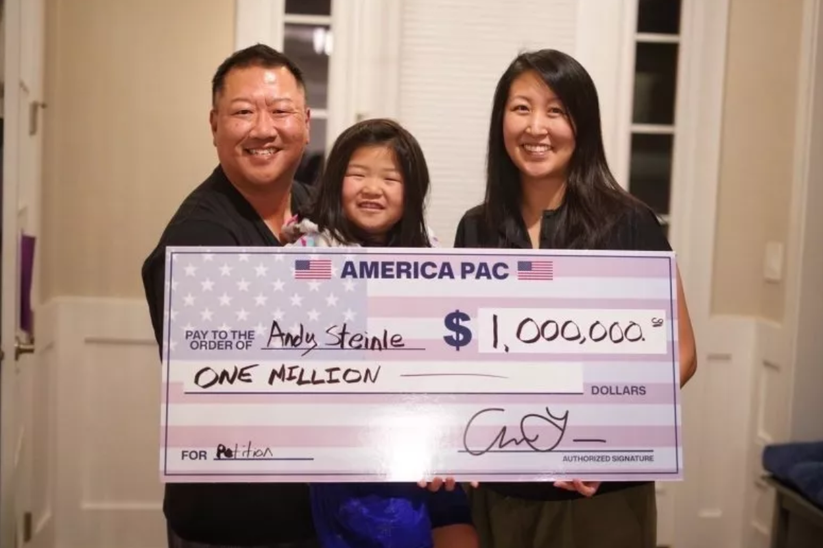 From North Carolina, Steinle, a patent examiner, posed with his check and praised Musk’s focus on the Constitution.