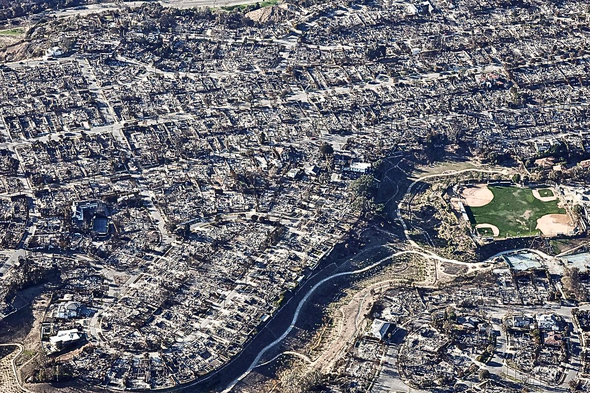 Los Angeles faces wildfire threat as strong winds return.